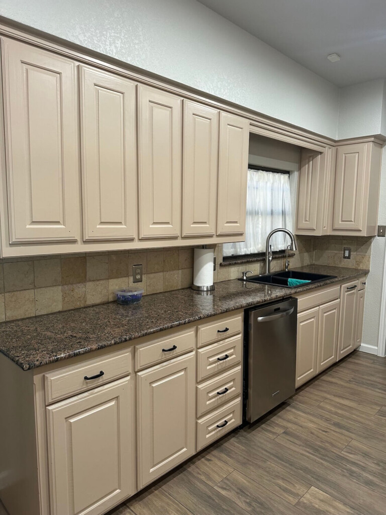 Cream colored cabinets before painting