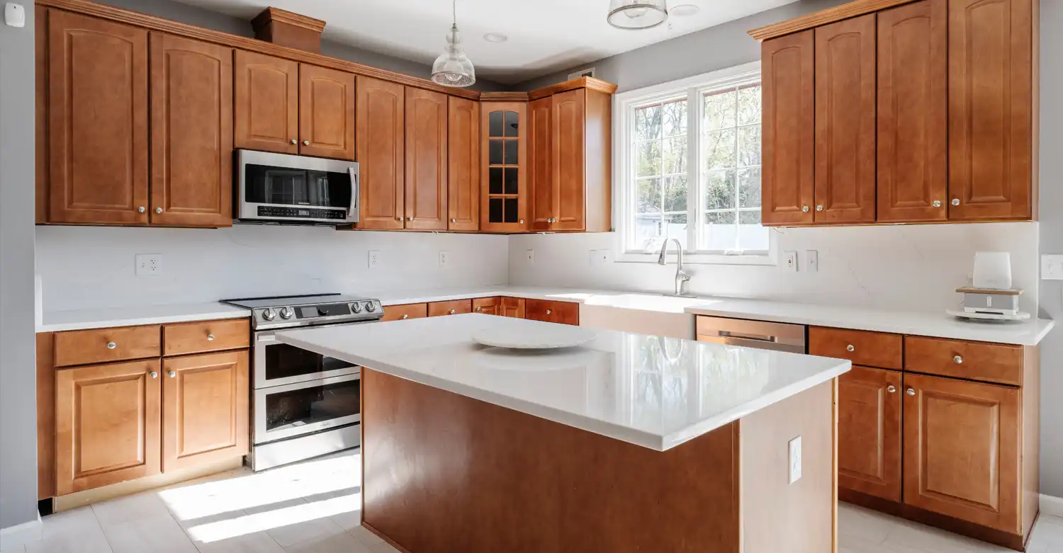 Honey oak cabinets before being painted