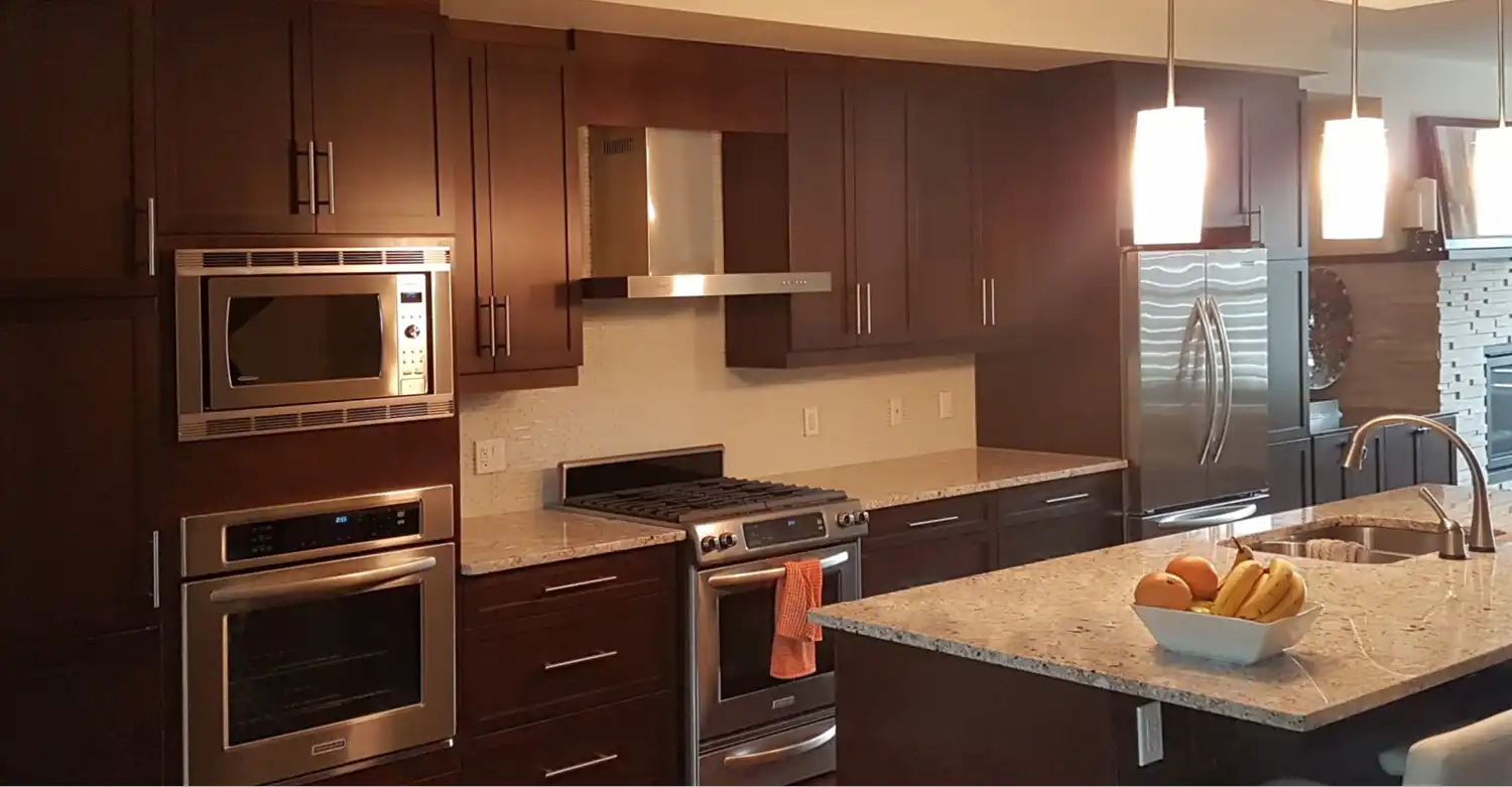 Dark espresso kitchen cabinets before refinishing